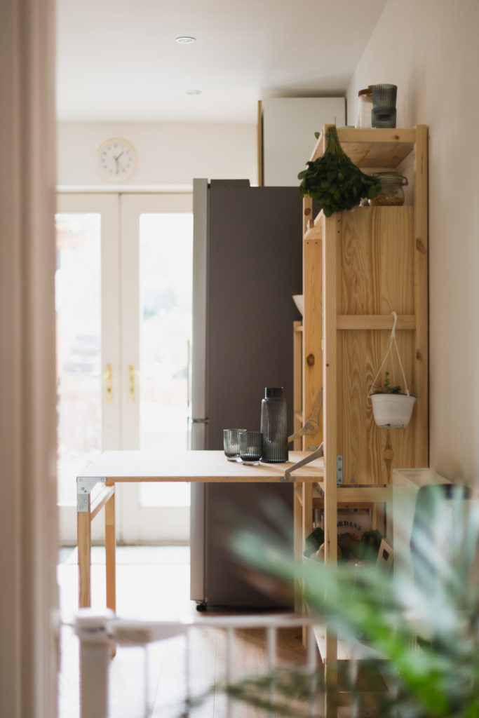 A kitchen with fold down table